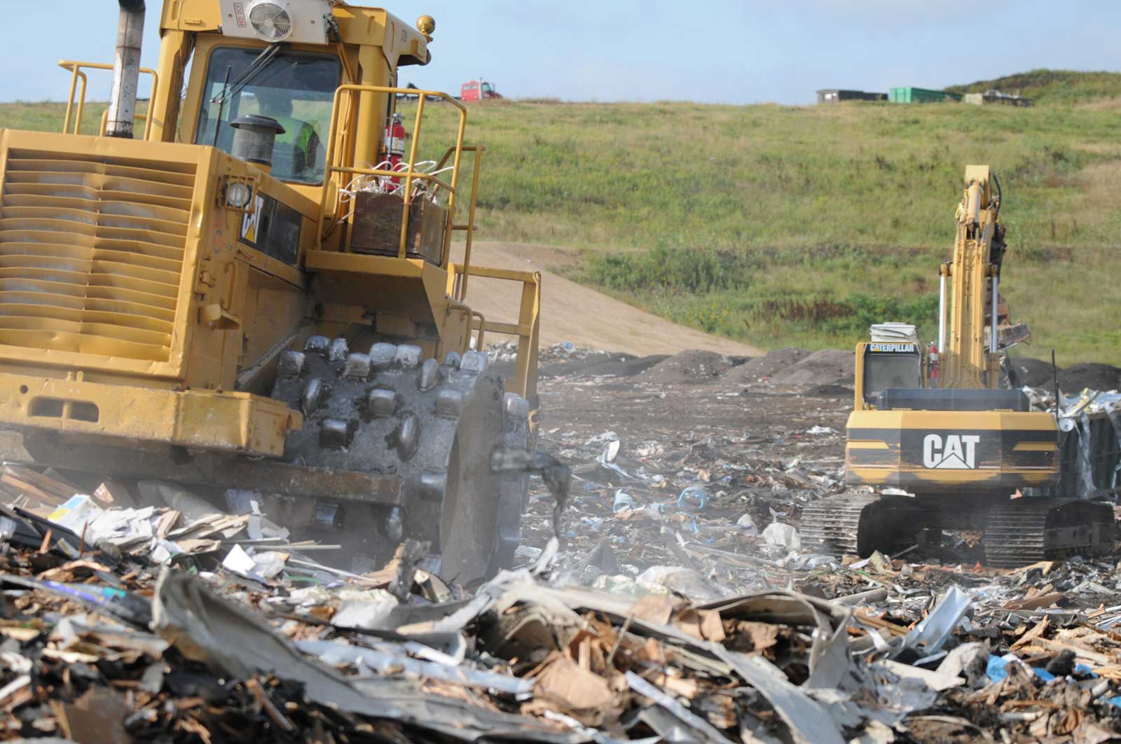 Dem-Con Crew cleans up/moves landfill waste