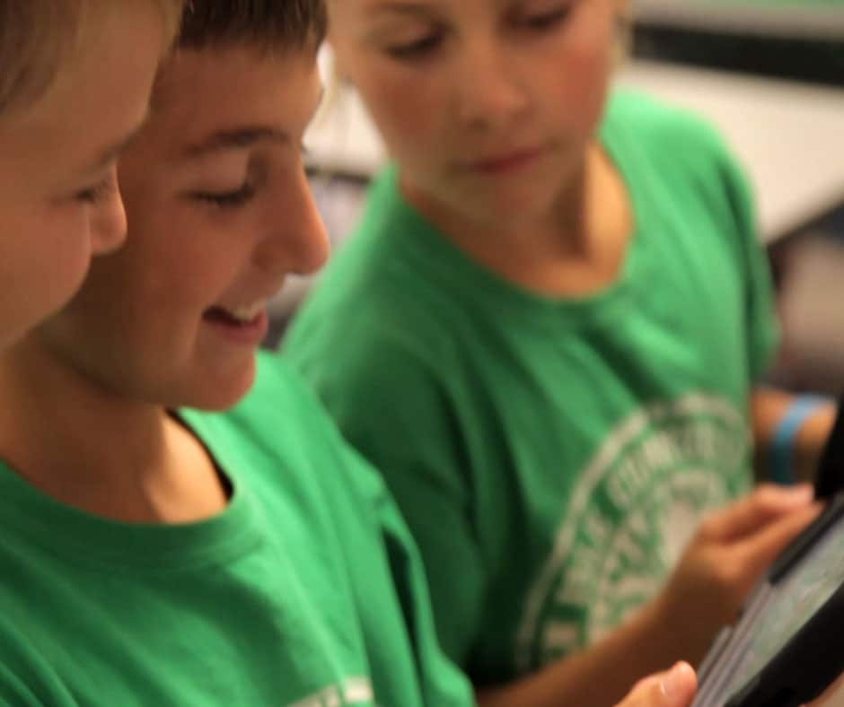 Education-Online_WasteRecycling_Sustainability_Curriculum Kids on tablet Education Online Waste Recycling and Sustainability Curriculum